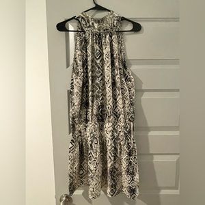 High neck snakeskin dress with a cinched waist!